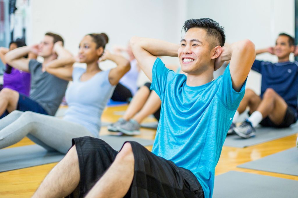 young man in a fitness class