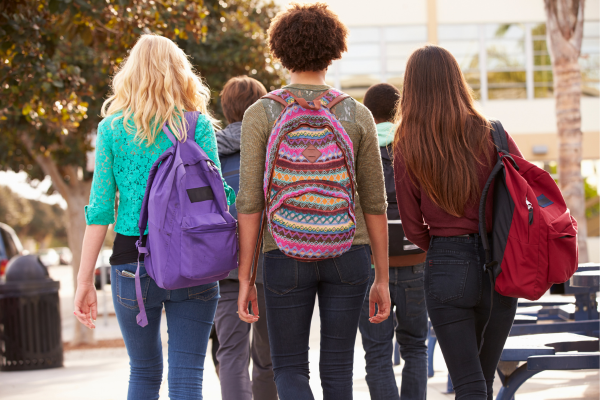 Group of teens with backpacks