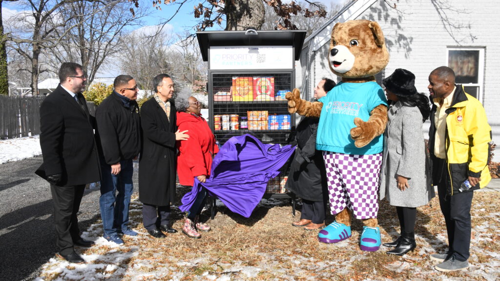 Priority Partners team unveils a new community pantry in Glen Burnie, Maryland.